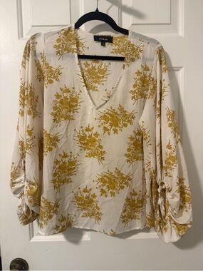 Aakaa White V-Neck Blouse with Mustard Floral Print
